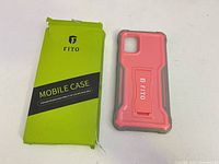 Front of box and phone case showing color, branding, and kickstand