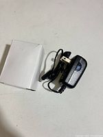Adapter with cable and box top view
