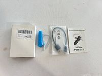 Full set showing earpiece, cable, manual and box