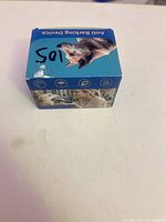 Retail carton top showing dog graphic and product name