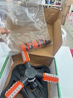 Sprinkler in box with one connector in plastic bag