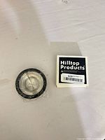 Recessed pull beside Hilltop Products box