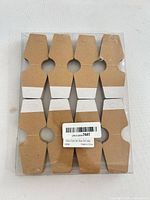 Front view of sealed pack of kraft brown necklace display cards