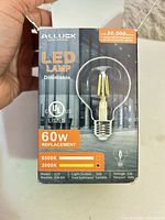 Front of Alluck LED bulb box showing product specifics and branding