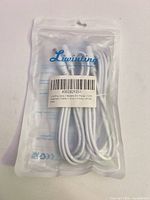 Front of sealed Liwinting package showing two coiled white cables and barcode label