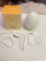 Night light, box front, charging cable, manual
