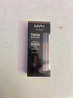 Front of sealed NYX Tinted Brow Mascara box