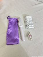 Electric nail file with pouch, attachments and instructions