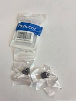 Outer Poyiccot bag with barcode and two sealed adapters