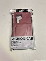 Front view of sealed rose pink phone case in Fashion Case packaging