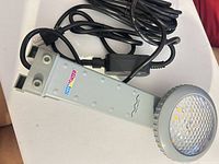 Overall view of SmartPool NL100 light with power cable and transformer