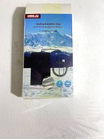 Front of sealed retail box showing product image and features