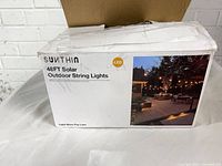 Front of SUNTHIN 48 ft Solar Outdoor String Lights box