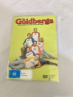 Front cover of DVD case showing title and rating sticker