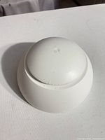 Top view of white dome-shaped nail dryer