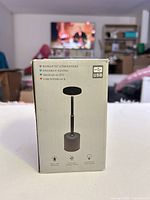 Front of retail box displaying lamp image and key features