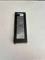 Front of boxed air mouse remote