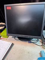 Front view of Lenovo 19-inch monitor on stand