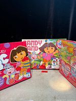 Group shot of all three boxed board games