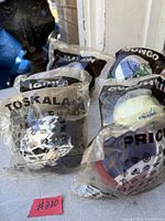 Group of sealed McDonald's NHL mini masks showing Toskala, Luongo, Ovechkin and two others