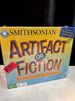 Front of sealed Smithsonian Artifact or Fiction board game box