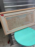 Full view of framed Southwestern relief art