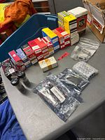 Row of boxed tubes, antistatic bags, dark glass tubes