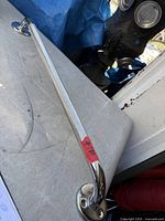 Full view of 27" chrome grab bar showing knurled grip and mounting flanges