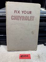 Front cover of tan hardcover book showing title Fix Your Chevrolet