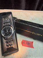 Watch in original Elgin box showing bracelet and dial