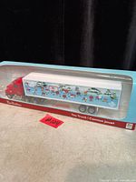 Front angled view of boxed Tim Hortons toy truck