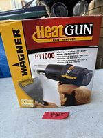 Front of Wagner HT1000 heat gun paint remover box showing model details and temperature specs