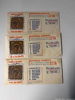 Three identical folders showing exterior graphics