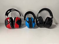 Three pairs of earmuffs side by side
