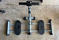 Top view of complete Leg Magic exercise glider showing frame and foot platforms