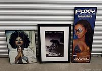 All three framed music posters together