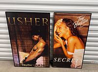 Usher and Toni Braxton framed posters side by side