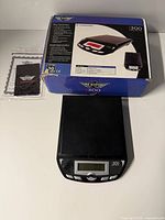 Boxed Elite i300 scale with scale shown outside the box