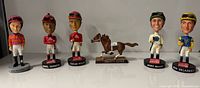 Group shot of all six bobbleheads lined up