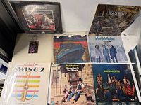 All eight sealed LPs front covers visible