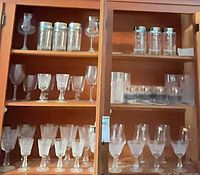 Cabinet showing full assortment of stemware and tumblers