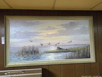 Front view of framed painting on wall