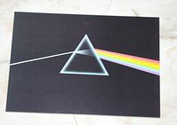 Front of one postcard showing Dark Side of the Moon prism artwork