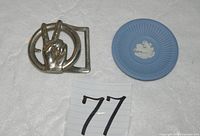 Overall lot showing buckle and dish