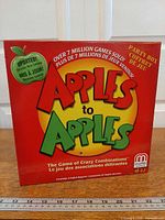 Front of Apples to Apples Party Box game showing title and branding