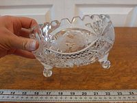 Side view showing frosted bird panel, cut pattern and three feet