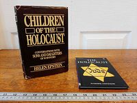 Front view of both hardcover books upright