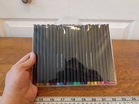 Front view of sealed pack showing full set of pens