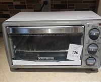 Front view of Black+Decker toaster oven showing overall exterior