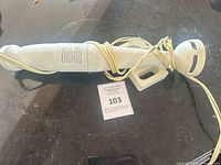 Full view of Braun immersion blender with cord wrapped